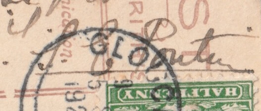 A close-up image of the sender's name at the bottom of the postcard